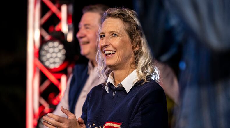 Republican incumbent Rep. Jen Kiggans, R-Va., running to represent Virginia's 2nd Congressional District in the U.S. House of Representatives, waits to go on stage and address supporters during a voting rally at Ballyhoos in Virginia Beach, Va., Monday, Nov. 4, 2024. (Kendall Warner/The Virginian-Pilot via AP)