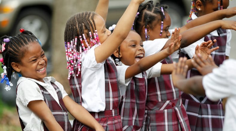 In this file photo from 2020, students at Dayton's Charity Adams Earley Girls Academy helped build raised garden beds to grow a variety of vegetables over the next few months. With assistance from Five Rivers MetroParks and parent volunteers the first through fourth grade students experienced first hand the smell of manure in compost mixtures and the feel of earth worms in the palm of their hands. FILE