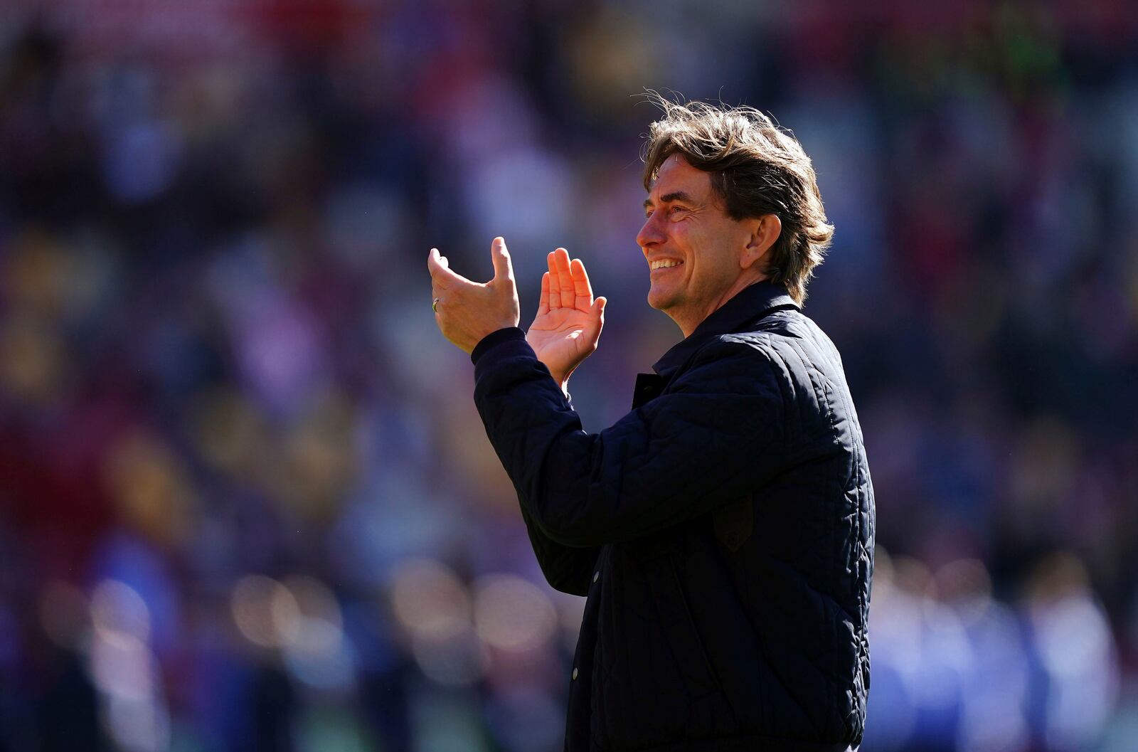 Brentford manager Thomas Frank claps at the end of the English Premier League soccer match between Brentford and Chelsea, at the Gtech Community Stadium, in London, Sunday April 6, 2025. (Zac Goodwin/PA via AP)
