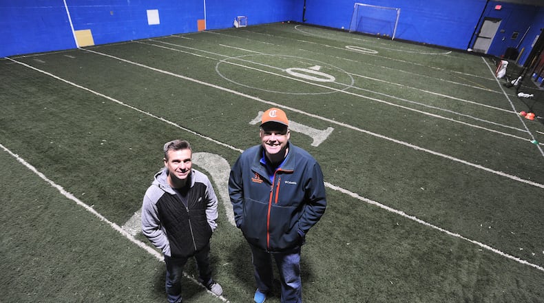 Brandon Hurt, left,  and Charles Hoskins, are the owners of Mr. Comfort's Sports Factory, that recently opened in a section of a warehouse at 325 N. Riverview Ave. in Miamisburg. MARSHALL GORBY\STAFF