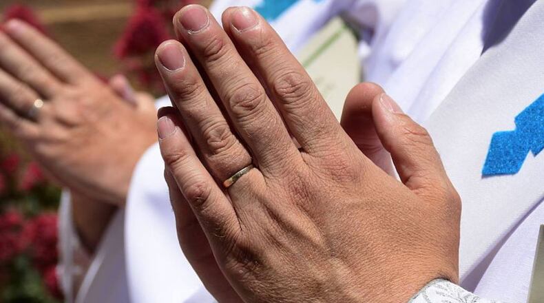 Praying hands were used to convey a message at a San Antonio hospital during the coronavirus pandemic.