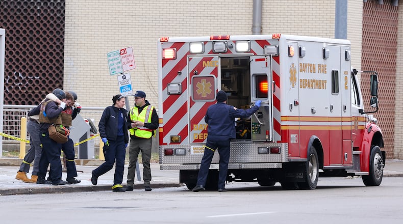 Dayton Police Department officers and Fire Department paramedics carry out an actor during training exercises on Monday, March 2 in downtown Dayton. BRYANT BILLING / STAFF