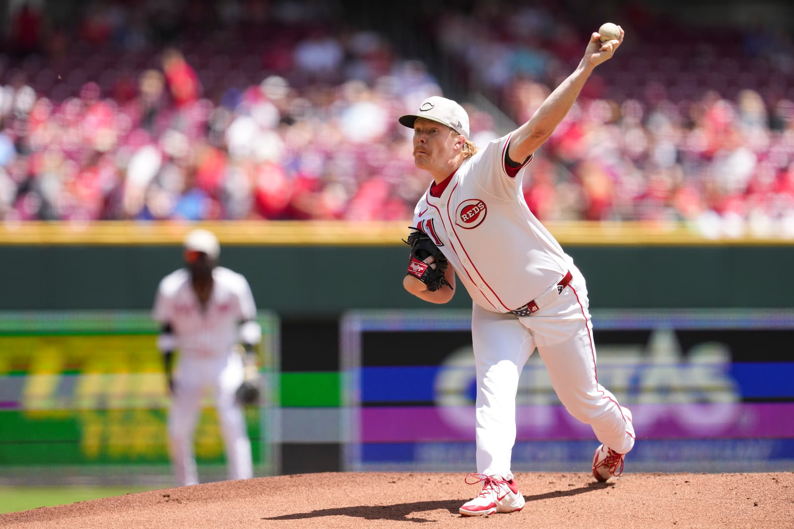 Cincinnati Reds pitcher Andrew Abbott throws during the first inning of a baseball game against the Cleveland Guardians, Sunday, May 18, 2025, in Cincinnati. (AP Photo/Jeff Dean)