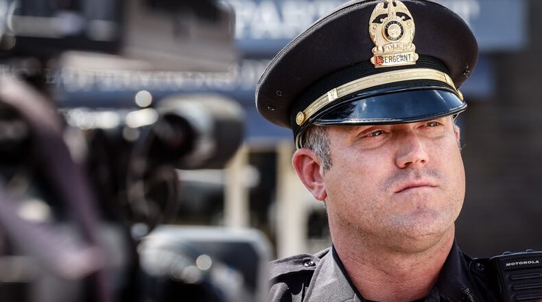 Dayton police Sgt. Jon Sopczak talks to the press about school safety Monday afternoon, Aug. 15, 2022, as students start to return to the classroom. JIM NOELKER/STAFF