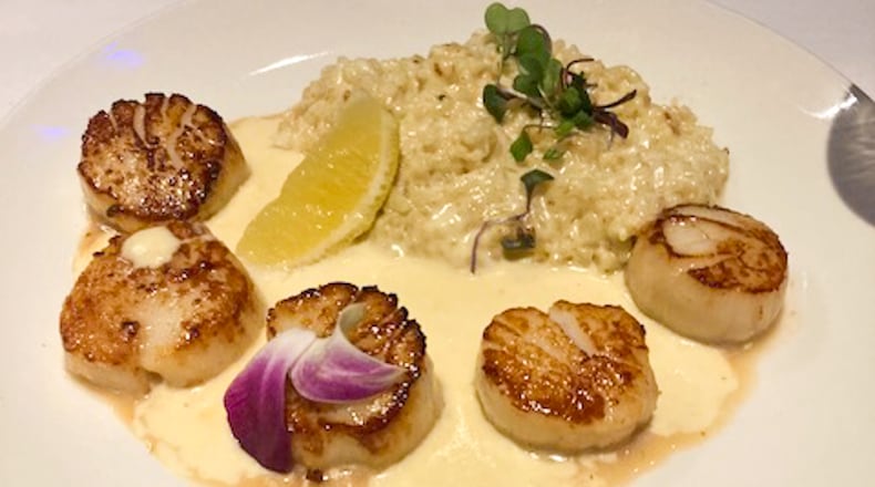 Scallops with risotto and asiago butter at Club Oceano at The Greene, Beavercreek. RAY MARCANO/CONTRIBUTED