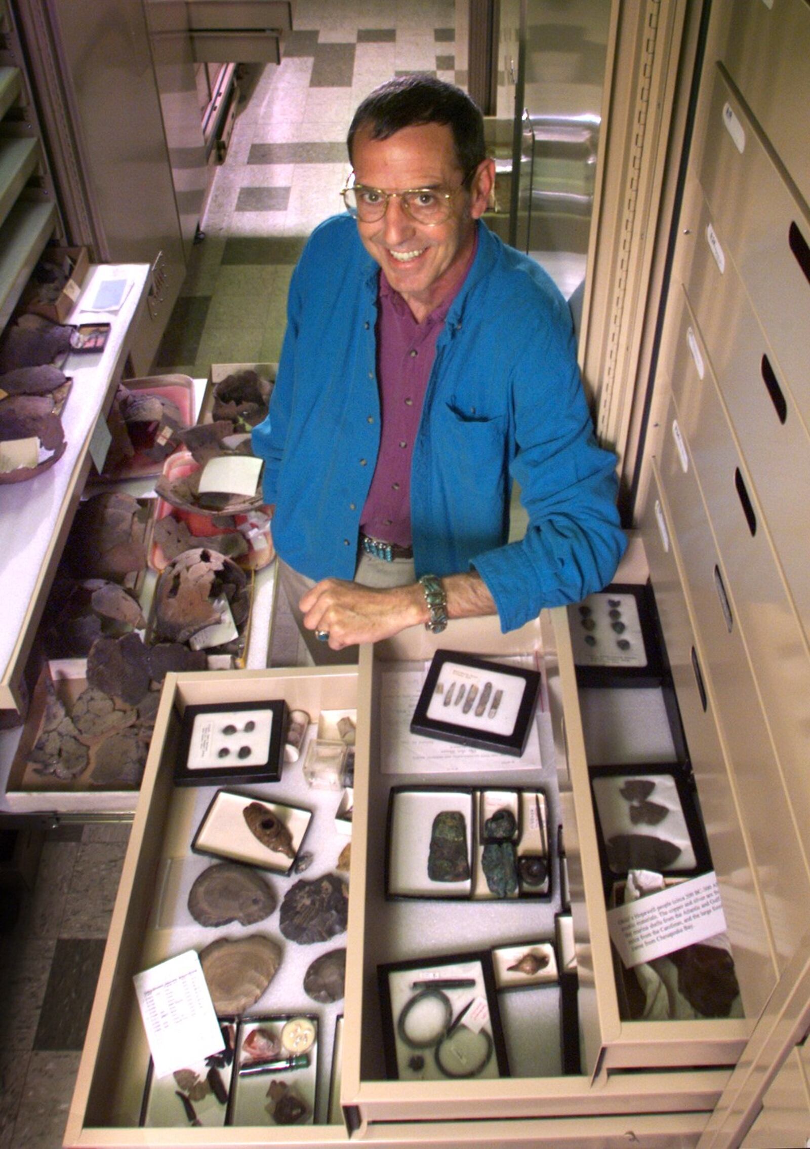 J Heilman, curator of anthropology at the Boonshoft Museum of Discovery, shows some of the artifacts excavated in digs around the Miami Valley in 1999. DAYTON DAILY NEWS ARCHIVES