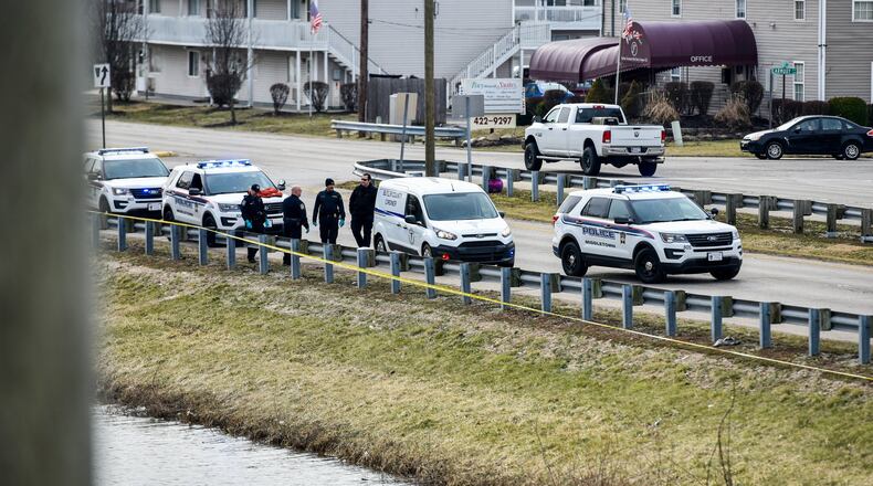 Someone called police Sunday, March 10 about a body in a pond along N. Verity Parkway in Middletown. A man’s body was pulled out of the water. The Butler County Coroner’s office and Middletown police are investigating. NICK GRAHAM/STAFF