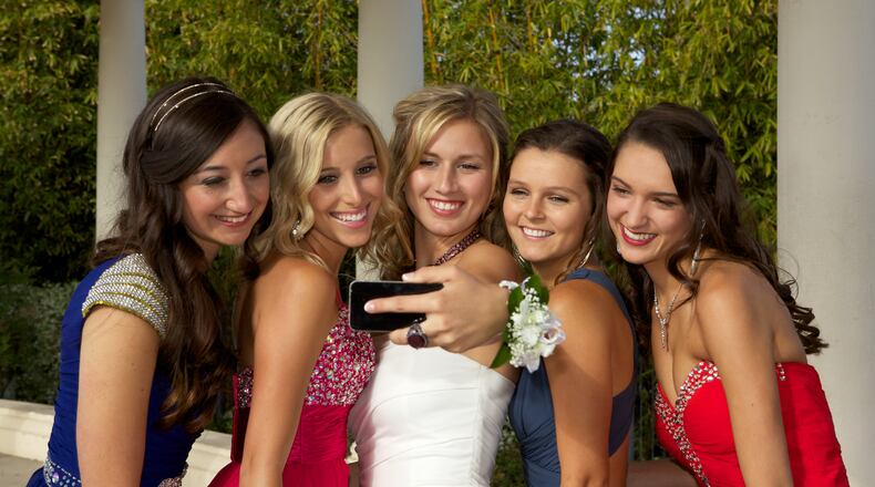 Angle, poses and framing are just some of the tips for achieving the perfect, Instagram-worthy photo. Source: Shutterstock.com