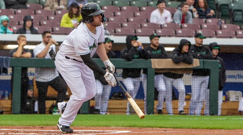 Sal Stewart watches the first hit of his four-hit night for the Dragons on Tuesday. He knocked in the Dragons' only runs with another single two innings later for a 2-1 victory at Day Air Ballpark. Jeff Gilbert/CONTRIBUTED