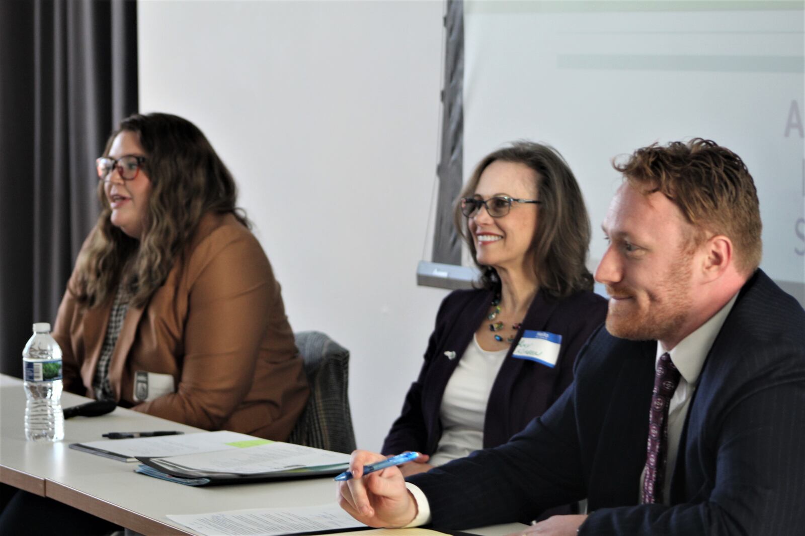 Emma Smales, Amy Klaben and Marty Gehres discuss source of income protection and discrimination issues during a panel at the City of Dayton 2022 Fair Housing Symposium on Oct. 27, 2022, at the Dayton Metro Library. CORNELIUS FROLIK / STAFF