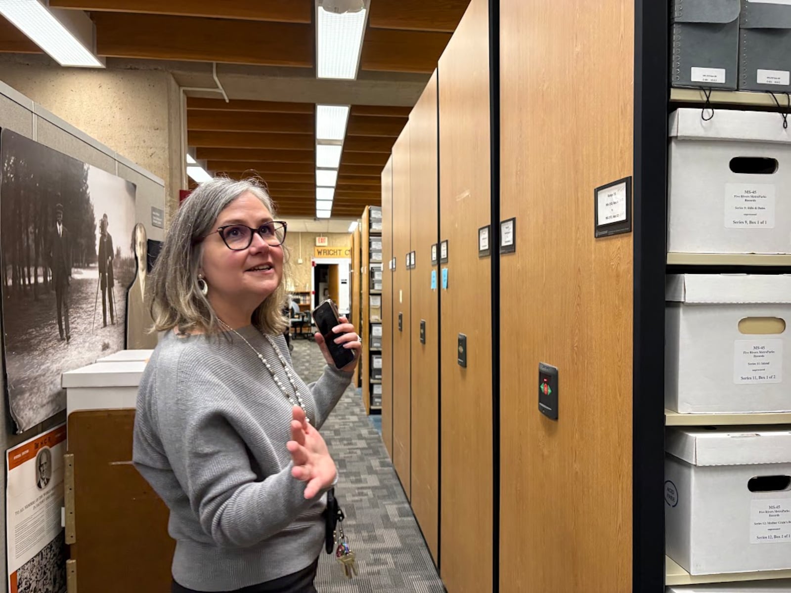 Toni Vanden Bos, head of special collections and archives at Wright State University, shows off part of the university's massive collection of artifacts related to the Wright brothers on Friday, Jan. 30, 2026 at the university's Dunbar Library. THOMAS GNAU/STAFF