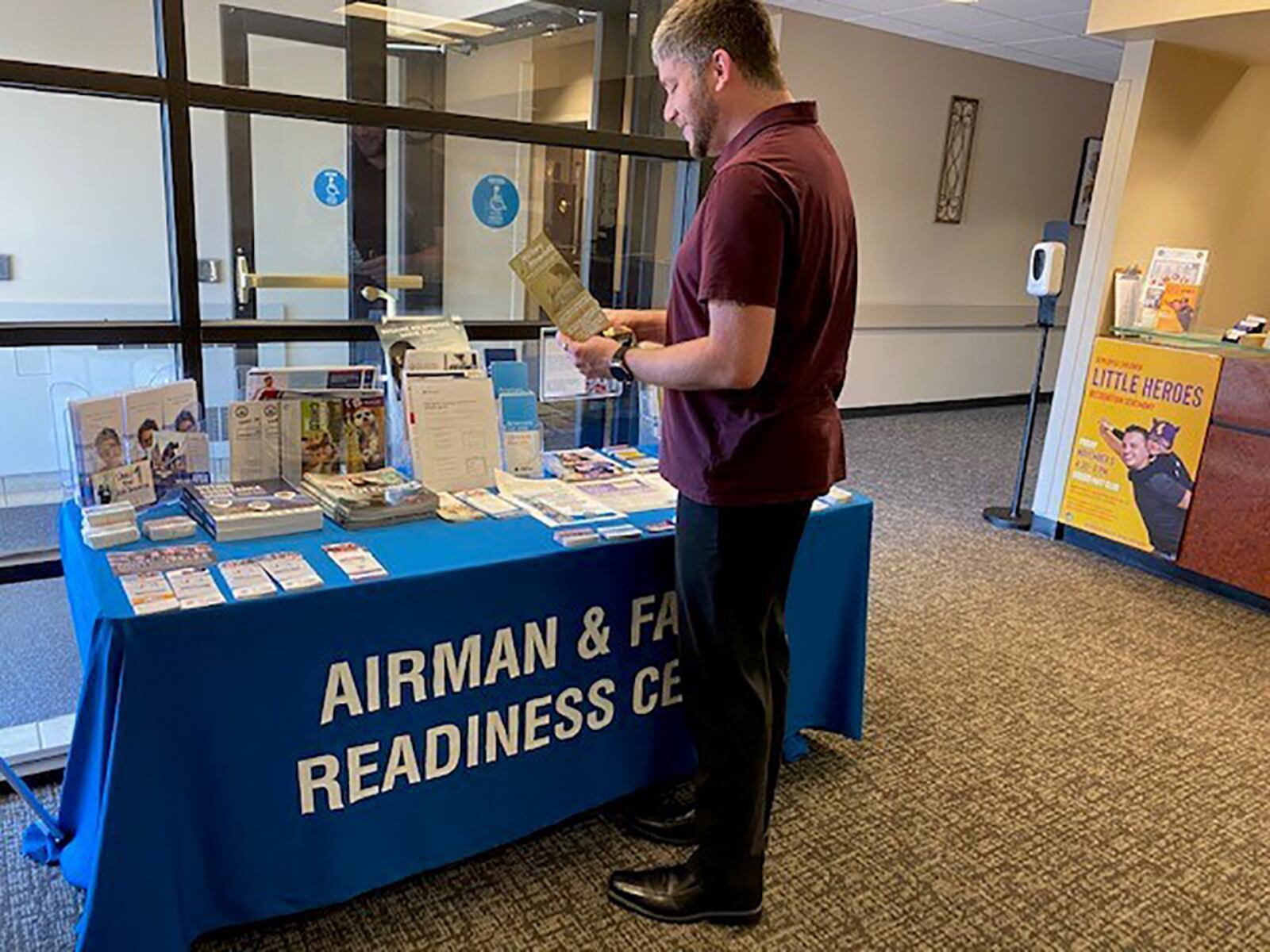 Theodore Thomas, an accounting technician with 88th Force Support Squadron Resources and ASPIRE program participant, gets firsthand experience with the Airman & Family Readiness Center as he reviews an informational table. The ASPIRE program is an Air Force Materiel Command initiative that exposes participants to the FSS portfolio over 12 weeks to prepare them for future leadership roles. CONTRIBUTED PHOTO