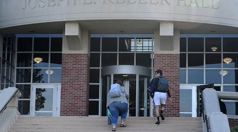 University of Dayton students enjoy walking around campus on a warm Tuesday morning, April 16, 2024. MARSHALL GORBY\STAFF
