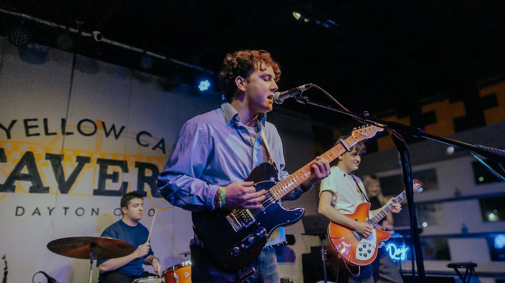 Kaleb Layton (front), John Szanto (left) and Isaac Lucas (right) of Dayton indie-pop band, Irby Ray. Its releasing its latest single "Waves" on Feb. 6. VICTORIA SWEARINGEN/CONTRIBUTED