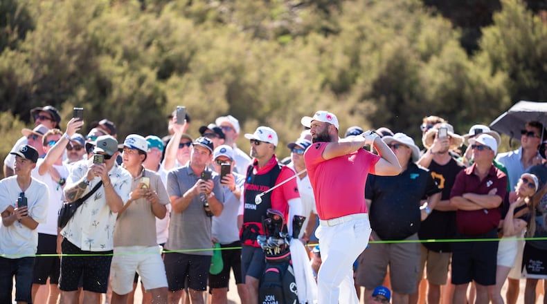 Captain Jon Rahm of Legion XIII hits his shot from the 13th fairway during the third round of the LIV Golf tournament at Grange Golf Club, Saturday, Feb 14, 2026 in Adelaide, Australia. (Mateo Villalba/LIV Golf via AP)