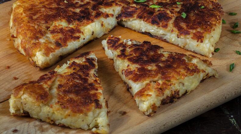 Rosti, the national pancake of Switzerland, is one big fat Frisbee that crisps up with ease, using just two ingredients. (Joan Moravek/styling) (Zbigniew Bzdak/Chicago Tribune/TNS)