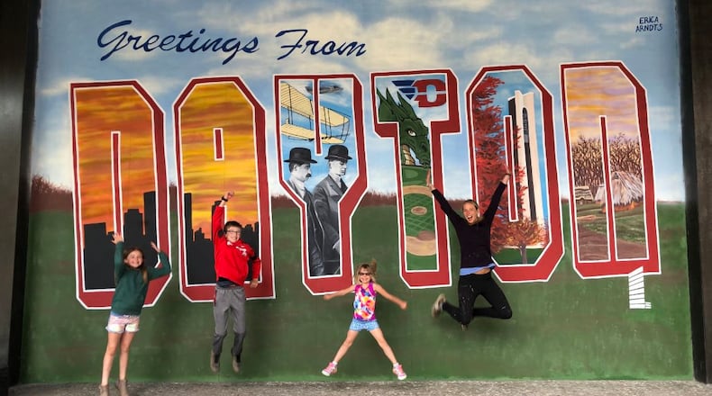 Erica Arndts spends half the year painting murals in Dayton. “My nieces and nephews will usually come to the job site and help me paint for a day.” CONTRIBUTED PHOTOS