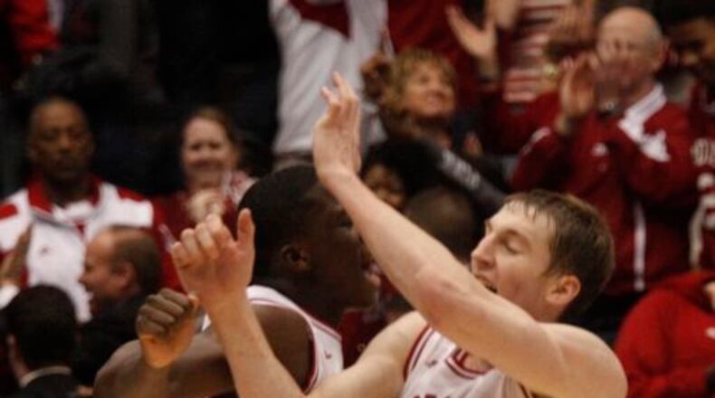 Victory Oladipo and Cody Zeller celebrate. Indiana beat Temple 58-52 on Sunday, March 24, 2013, in the third round of the NCAA tournament at UD Arena.