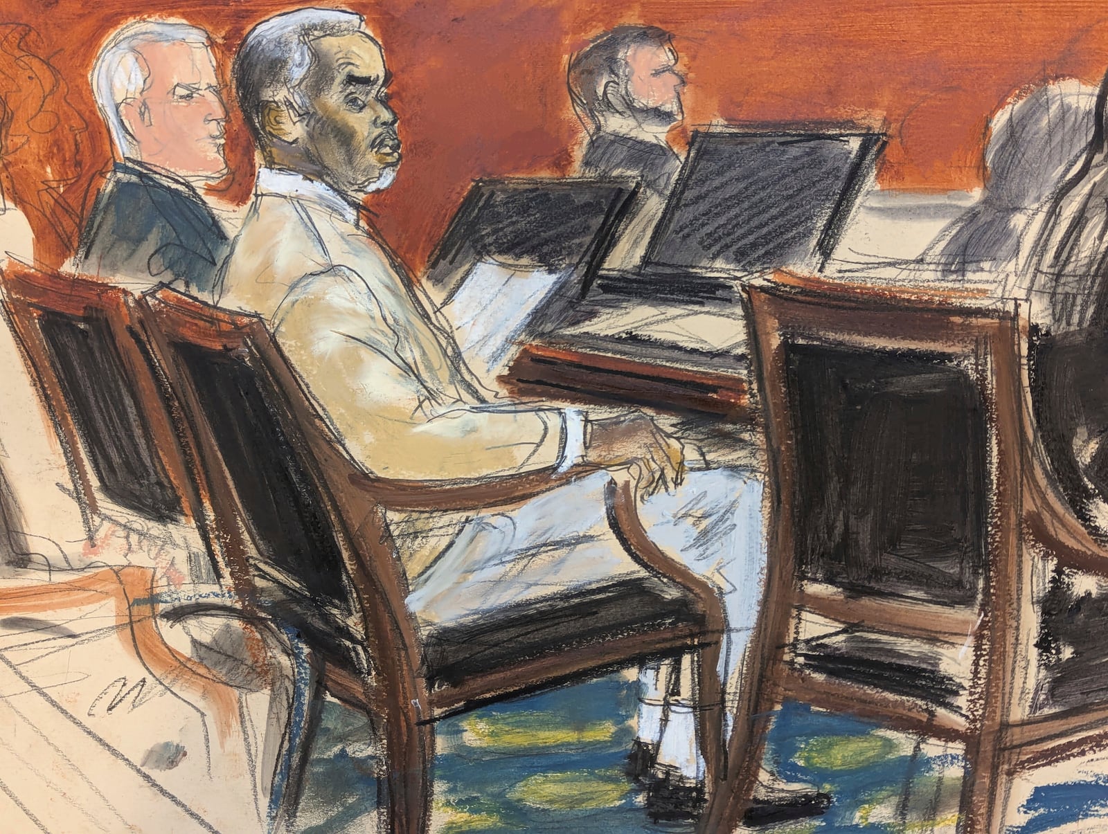 Sean ' Diddy' Combs, second from left, watches from the defense table as Judge Arun Subramanian speaks to the jury in Manhattan federal court, Tuesday, July 1, 2025, in New York. (Elizabeth Williams via AP)
