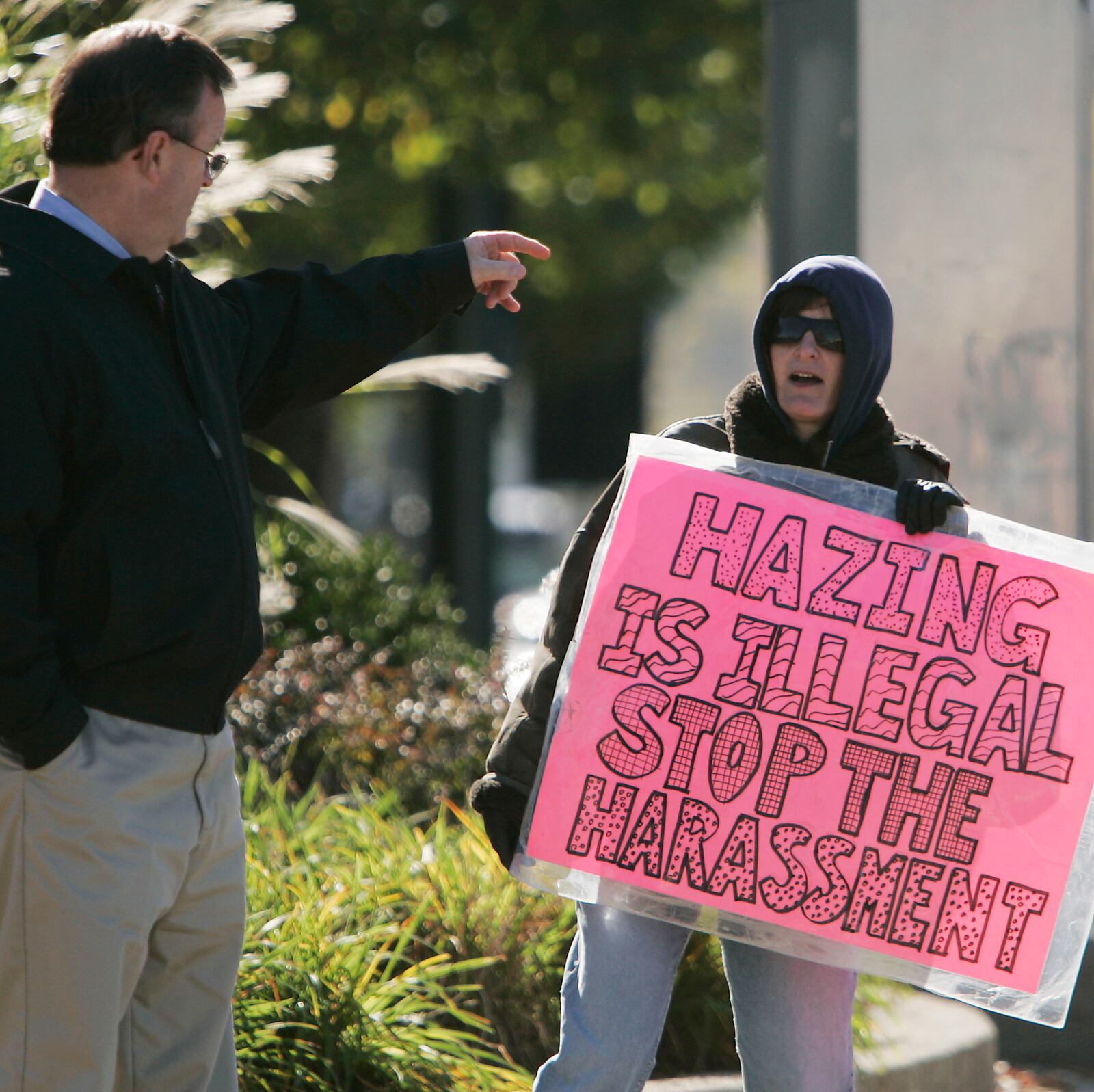 Elizabeth Thompson has been  protesting at the corner of Brown and Stewart Streets for 8 years. Thompson, a UD grad who received her Ph.D. in electrical engineering, is protesting harassment  and unfair treatment  that she says she endured while attending UD. Staff photo by Jim Noelker