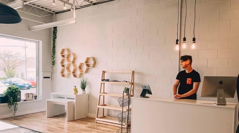 The owners of Vapor Haus or opening a new chain of CBD stores called CBD Haus. Jake Pendley stands at the counter. CONTRIBUTED