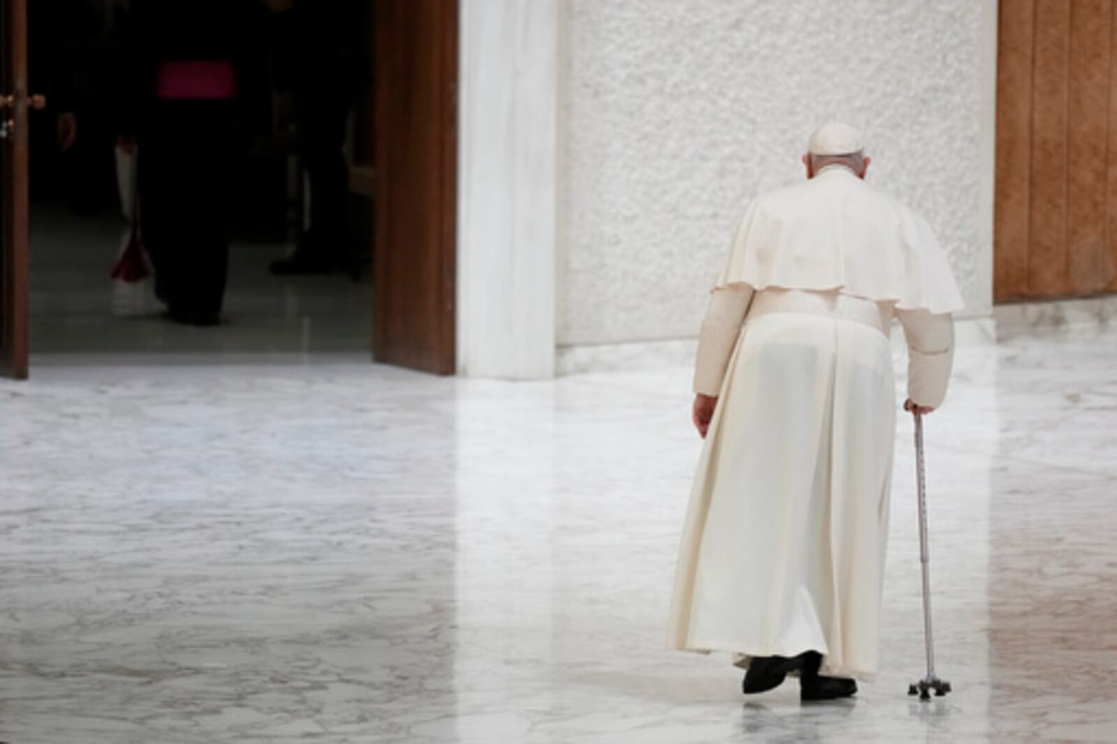 FILE - Pope Francis leaves after a meeting with the performers of the living nativity scene of St. Mary Major, in the Pope Paul VI hall at the Vatican, Saturday, Dec. 16, 2023. (AP Photo/Andrew Medichini, File)