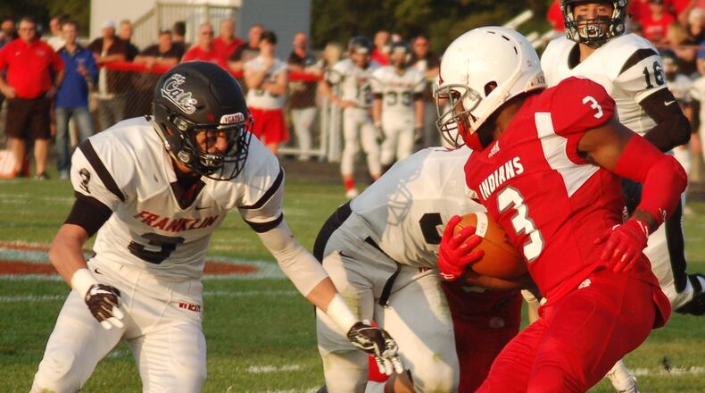 Franklin’s Kyle Rickard (3) moves in to make a tackle on Carlisle’s D.J. Chambers on Aug. 25 during the visiting Wildcats’ 47-14 triumph at Laughlin Field. CONTRIBUTED PHOTO BY JOHN CUMMINGS