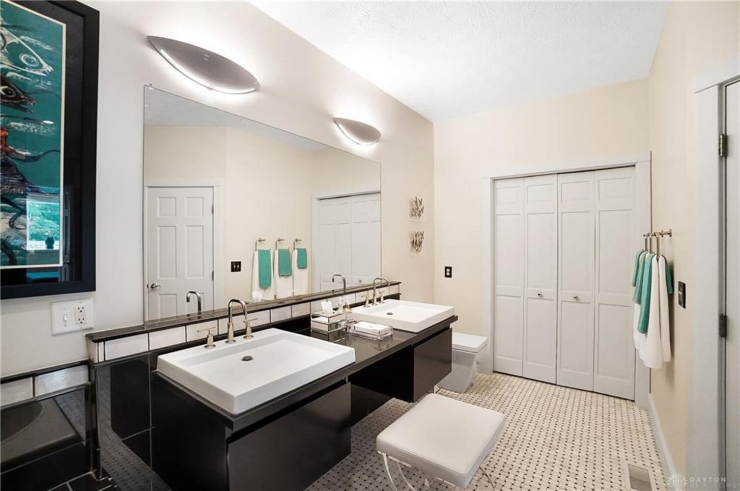 PHOTOS: Spectacular $1.8M luxury home on market with pool, golf simulator