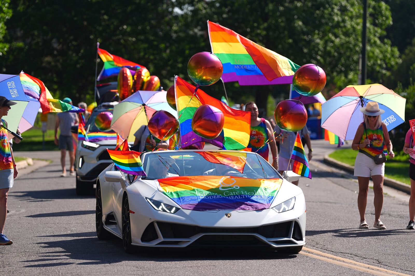 Participants head out of Cheesman Park to take part in a parade to celebrate pride month Sunday, June 29, 2025, in Denver. (AP Photo/David Zalubowski)