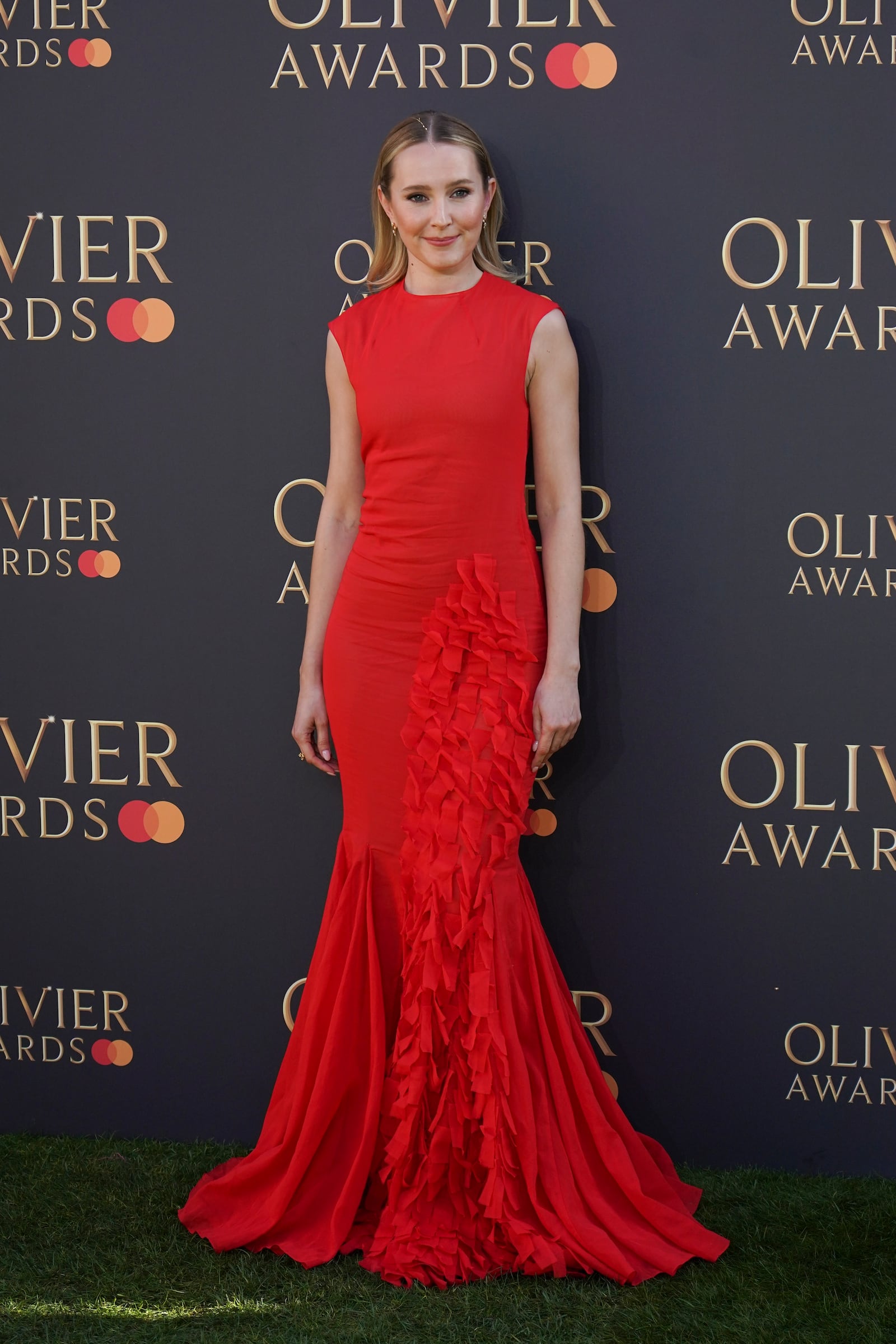 Rose Ayling-Ellis poses for photographers upon arrival at the Olivier Awards on Sunday, April 6, 2025, in London. (Photo by Alberto Pezzali/Invision/AP)