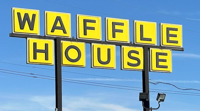 FILE - A Waffle House sign is shown in Indianapolis Feb. 19, 2024. (AP Photo/Isabella Volmert, File)