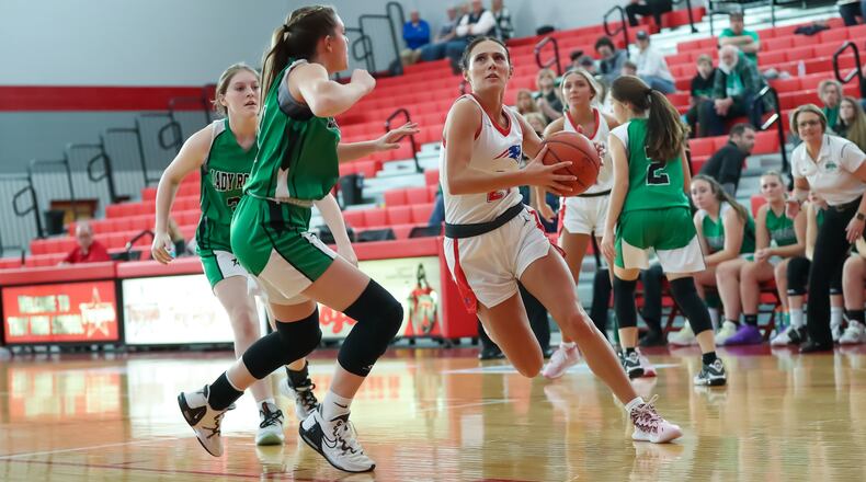 Tri-Village High School senior Torie Richards drives to the basket during their Division IV district semifinal game against Fayetteville Perry on Saturday afternoon at Troy High School. CONTRIBUTED PHOTO BY MICHAEL COOPER