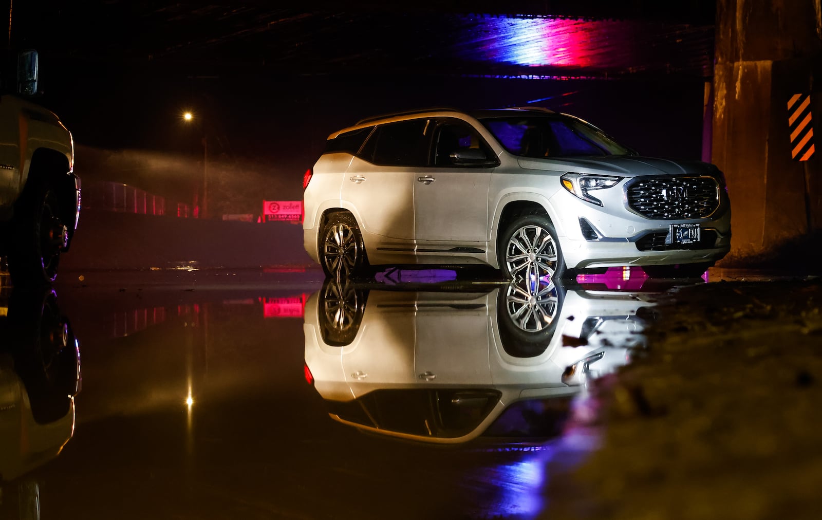 A crew from Ohio Department of Transportation works to clear drains on a flooded Germantown Road early Thursday morning, March 5, 2026 in Madison Township in Butler County. Heavy rain caused flooding in many areas. NICK GRAHAM/STAFF