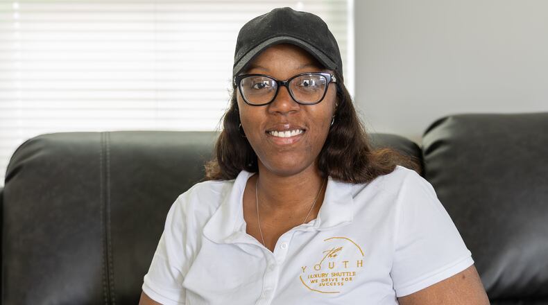 Courtney Brandon has been named a Dayton Daily News Community Gem for her work founding The Youth Luxury Shuttle, which transports kids to and from school. BRYANT BILLING / STAFF