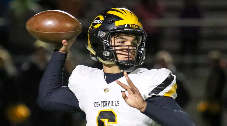 Centerville High School quarterback Chase Harrison throws a pass during their game on Thursday night at Springfield High School. The Wildcats won 41-28. CONTRIBUTED PHOTO BY MICHAEL COOPER