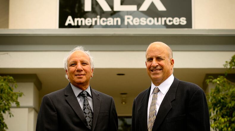 In this file photo, Zafar Rizvi, left, the company’s chief executive, stands with board Chairman Stuart Rose. Rose left the company's CEO position in 2015.