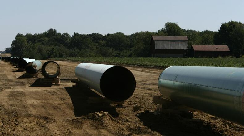 Pipe laid out in Central Indiana farmland on its way to Ohio in 2008. The $5 billion project was built to move natural gas from the Rocky Mountains to Ohio. FILE