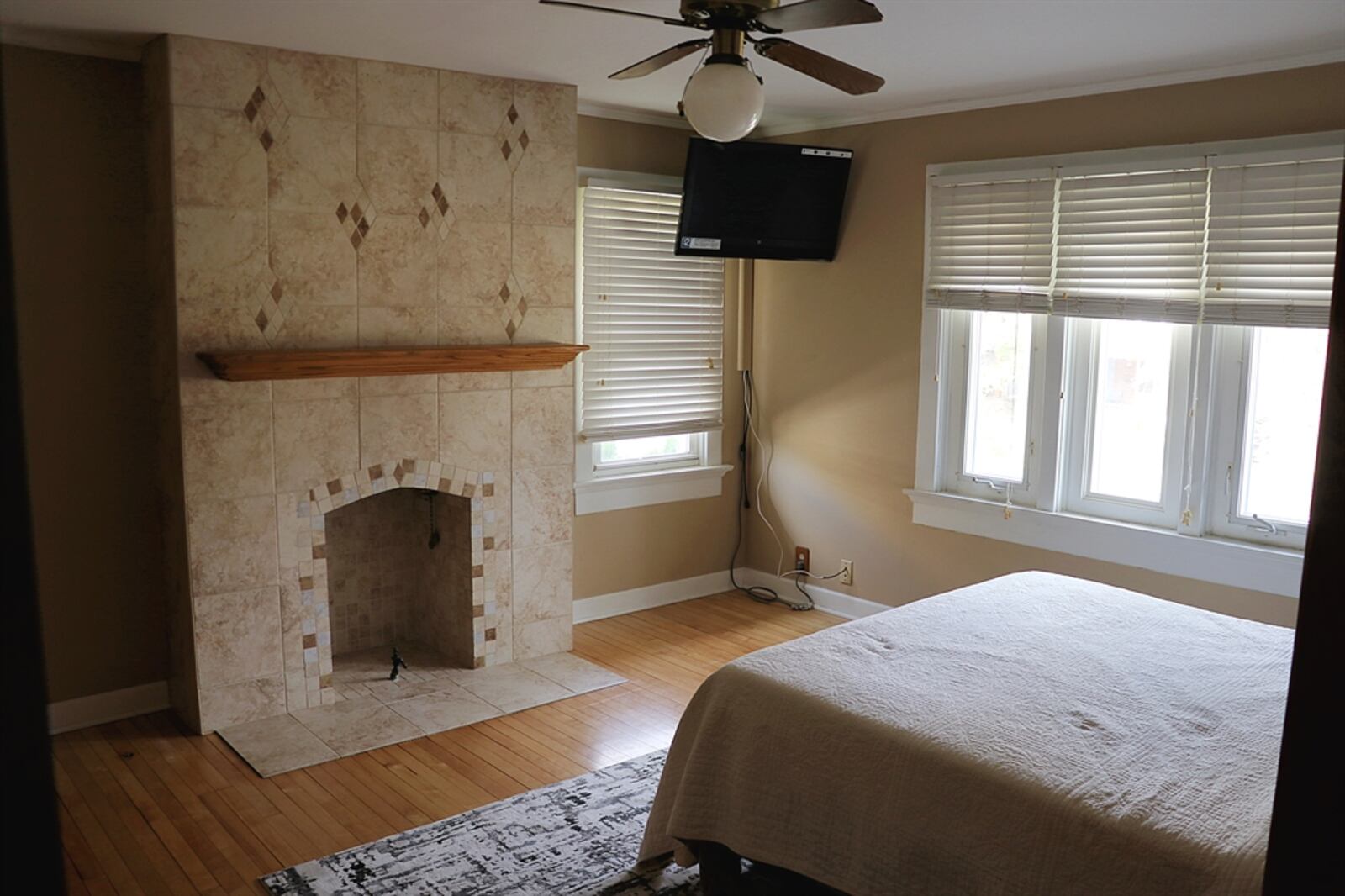 Located on one of the tree-lined boulevards of Oakwood, this two-story home at 14 E. Dixon Ave. in Oakwood has a traditional floor plan with some cozy built-ins and upstairs flexible space. CONTRIBUTED