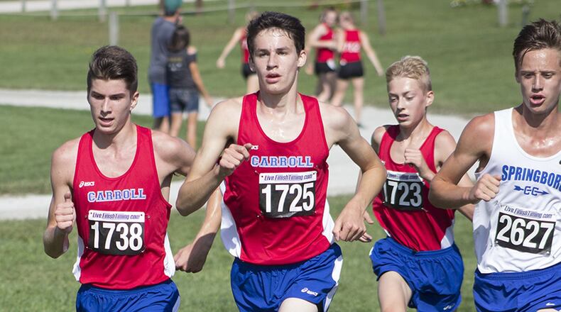 Carroll runners (left to right) Karl Grossman, Grant Arnold and Kevin Agnew led the Patriots to victory Saturday in the Division I race at the Cedarville University Friendship Invitational. Alex Berardi led Springboro to a second-place finish. JEFF GILBERT / CONTRIBUTED