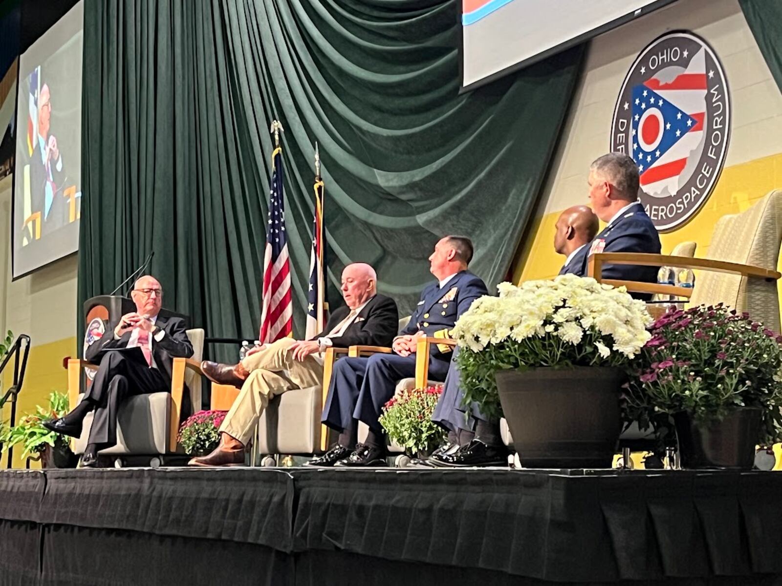 A panel at the Ohio Defense and Aerospace Forum Tuesday at Wright State University. From left: Retired Col. Joe Zeis, defense advisor to Ohio Gov. Mike DeWine; retired Air Force Gen. Michael "Buzz" Moseley; Coast Guard Rear Admiral Jon Hickey; Space Force Col. Marcus Starks, commander of the National Space Intelligence Center and Air Force Col. Kenneth Stremmel, commander of the National Air and Space Intelligence Center, or NASIC. THOMAS GNAU/STAFF