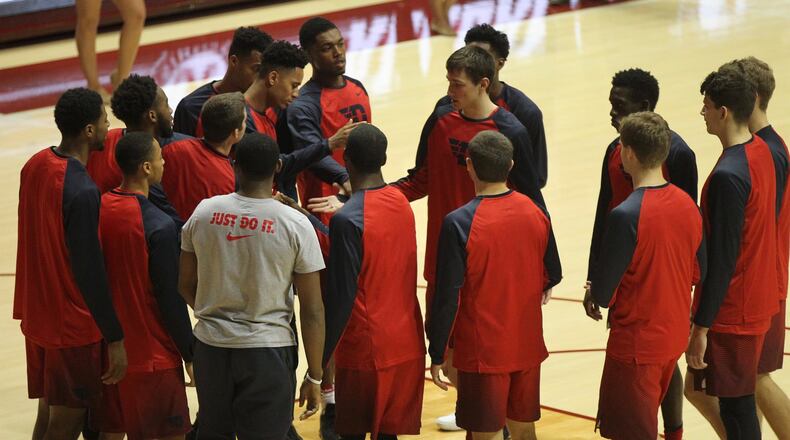 Dayton players huddle before a game against Alabama on Tuesday, Nov. 15, 2016, at Coleman Coliseum in Tuscaloosa, Ala. David Jablonski/Staff