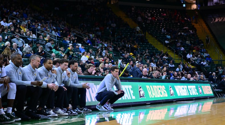 Wright State head coach Clint Sargent kneels on the sideline during the Raiders' game earlier this season vs. Air Force. Joe Craven/Wright State Athletics