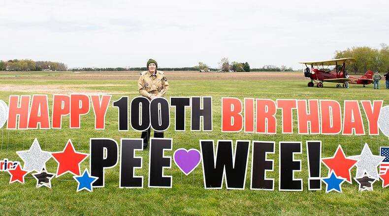 World War II veteran Jim “Pee Wee” Martin, poses for a photo during a 100th birthday celebration held in his honor April 23 in Xenia, Ohio. Martin served as a paratrooper assigned to 101st Airborne Division, 506th Infantry Regiment, G Company, out of Fort Campbell, Kentucky. U.S. AIR FORCE PHOTO/WESLEY FARNSWORTH