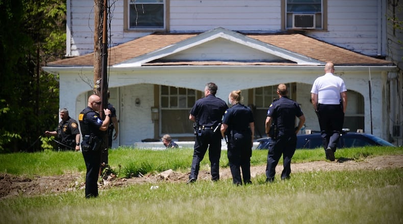 One person was injured in a shooting near Kumler Avenue in Dayton Wednesday. MARSHALL GORBY / STAFF