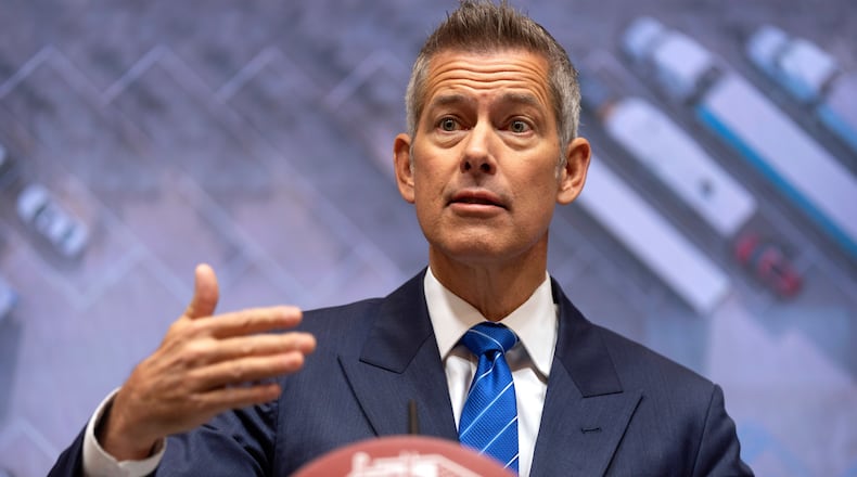 Transportation Secretary Sean Duffy speaks during a news conference at the Department of Transportation in Washington, Friday, Dec. 12, 2025. (AP Photo/Mark Schiefelbein)