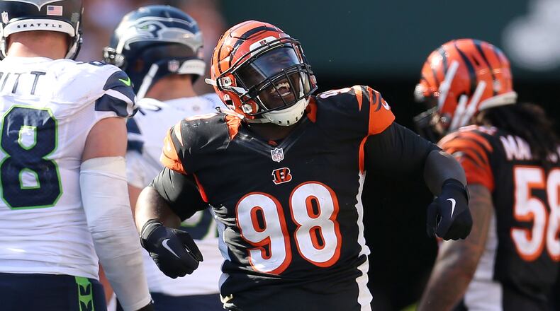 CINCINNATI, OH - OCTOBER 11: Brandon Thompson #98 of the Cincinnati Bengals celebrates after making a defensive stop during overtime against the Seattle Seahawks at Paul Brown Stadium on October 11, 2015 in Cincinnati, Ohio. Cincinnati defeated Seattle 27-24 in overtime. (Photo by Andy Lyons/Getty Images)