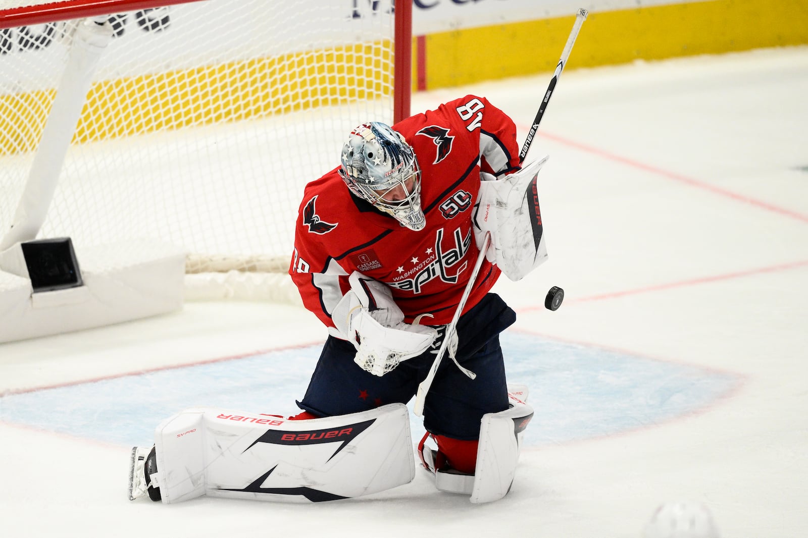 Washington Capitals goaltender Logan Thompson stops the puck in the third period of Game 1 of a first-round NHL hockey playoff series against the Montreal Canadiens, Monday, April 21, 2025, in Washington. (AP Photo/Nick Wass)
