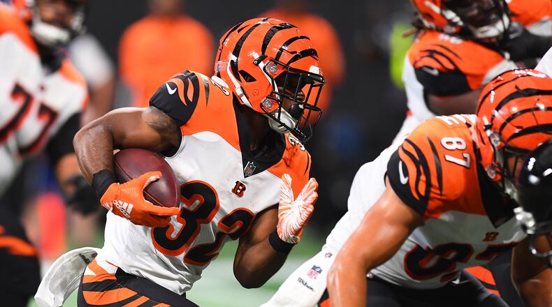 ATLANTA, GA - SEPTEMBER 30: Mark Walton #32 of the Cincinnati Bengals runs the ball during the fourth quarter against the Atlanta Falcons at Mercedes-Benz Stadium on September 30, 2018 in Atlanta, Georgia. (Photo by Scott Cunningham/Getty Images)