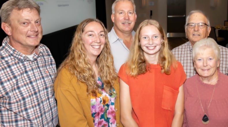 Brooke Bergman (center), now a senior at Versailles High School, overcome numerous injuries after a car accident that happened on Sept. 18, 2024. Bergman is pictured with her family at Miami Valley Hospital’s annual Trauma Survivors Celebration on Tuesday, Oct. 7, 2025. CONTRIBUTED