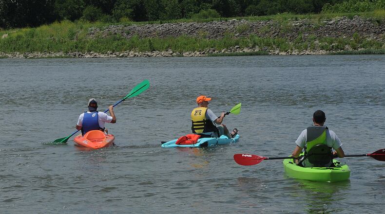 More than 100 paddlers signed up to canoe and kayak down the Great Miami River on Thursday, July 14, 2022 as part of the Great Float event. The 5-mile float started at Miami Bend Park in West Carrollton and led paddlers to Case Landing in Miamisburg. The float, sponsored by the Great Miami Riverway organization, also highlighted some areas where riverfront development is starting to take shape. MARSHALL GORBY\STAFF